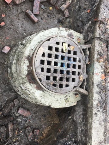 Collapsed catch basin after repair completed