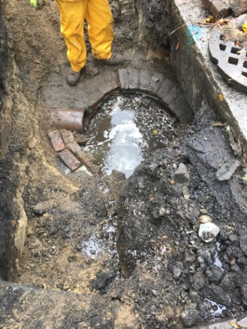 Collapsed catch basin during repair