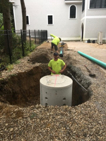 Dry well installation during excavation